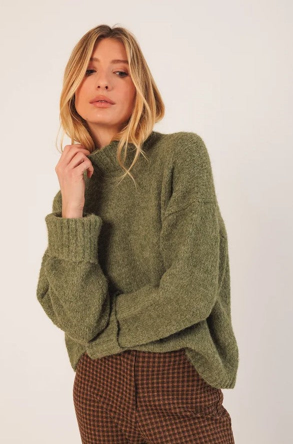 Chunky knitted sweater with a turtle neck in Green | Indi & Cold