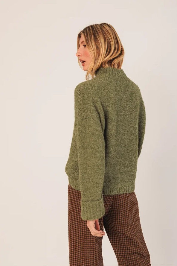 Chunky knitted sweater with a turtle neck in Green | Indi & Cold